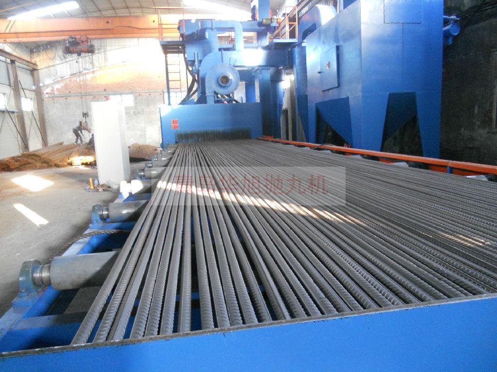 輥道通過式拋丸機(jī)批量清理鋼筋線材