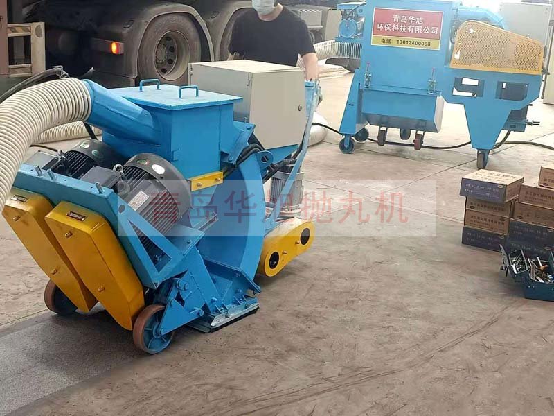 移動(dòng)式拋丸機(jī)清理鋼板表面鐵銹